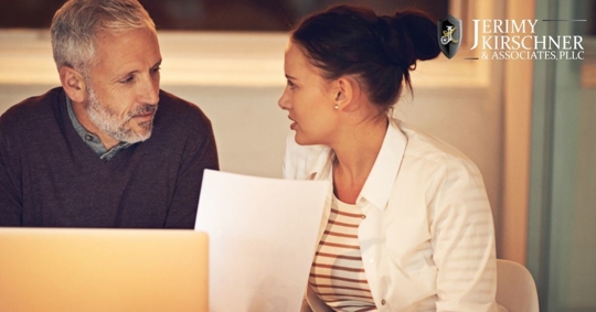 Adult daughter talking to older father about his power of attorney